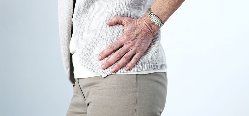 Patient experiencing hip pain and in need of a chiropractor